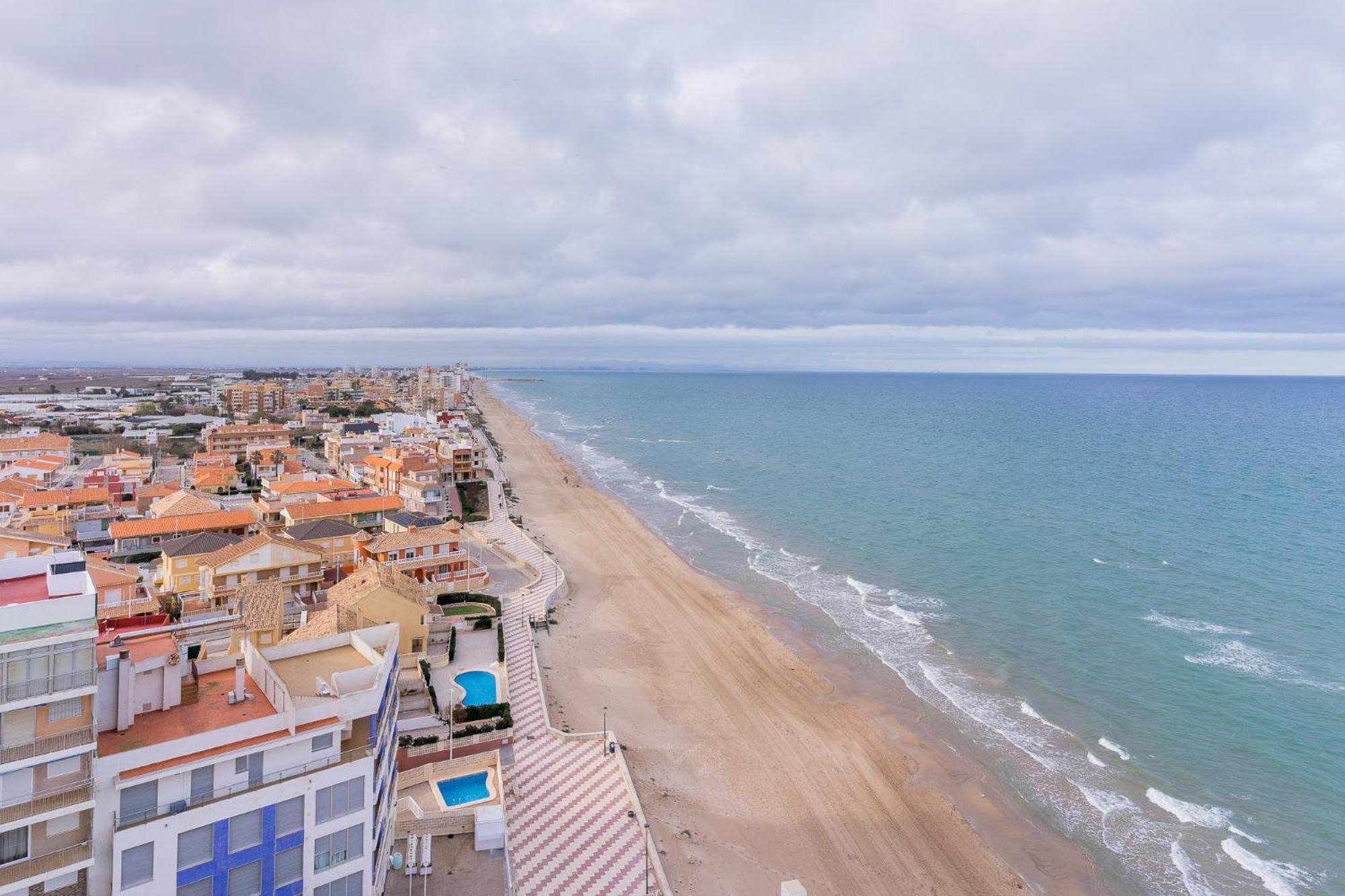 Ocean's Whisper: Les Palmeres Seaview Sanctuary Apartment *